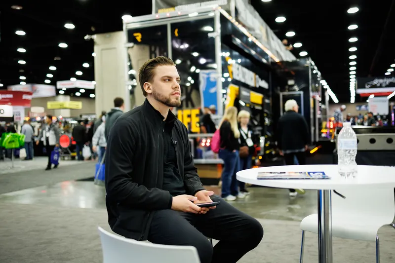 Andrius Pletniovas, founder of CDL Agency, at the Mid-America Trucking Show